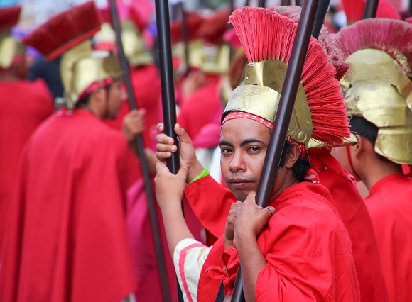 Roman soldier during easter procession in Antigua, Guatemala.